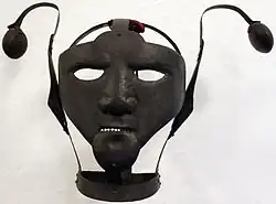 Masque de honte au Märkisches Museum Berlin, Allemagne, XVIIIe&nbsp;siècle.