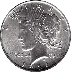 Pièce de monnaie comprenant le profil gauche d'une femme, les mots Liberty et In God we trsut et la date 1964.