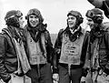 Les as du 357th Fighter Group : Richard A. Peterson&nbsp;(en) , Leonard K. Carson, John B. England&nbsp;(en) et Bud Anderson.