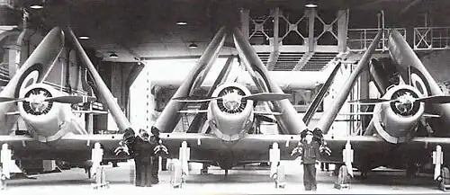 3 Vought V-156F français dans le hangar du porte-avions Béarn