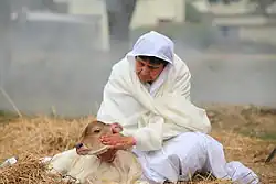 Nonne jaïne avec un veau.