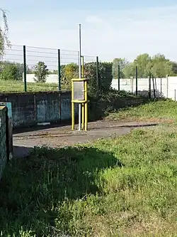 La tête de puits et l'exutoire de grisou.