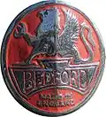 Ancienne version du logo de Bedford au griffon.