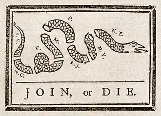 Gadsden flag et Join, or Die : deux drapeaux emblématiques de la révolution, représentés dans le jeu.