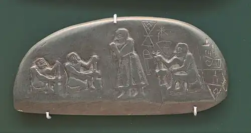 Plaque en pierre rapportant une vente de terre, avec un document complémentaire (« monuments Blau »), début du IIIe&nbsp;millénaire&nbsp;av. J.-C. British Museum.