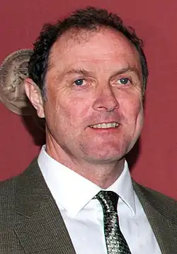 Boris McGiver dans le rôle de Tom Hammerschmidt