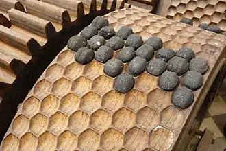 Une presse à Boulets.