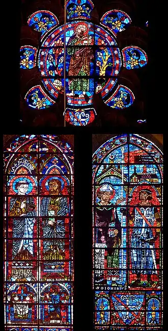 Baie 116, mur estRose : saint Jean-BaptisteGauche : 2 saints inconnusDroite : saint Denis.