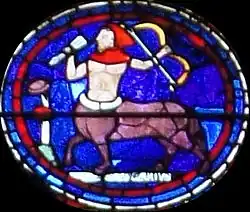 Peinture sur vitrail du sagittaire, représenté par un Centaure tenant un arc.