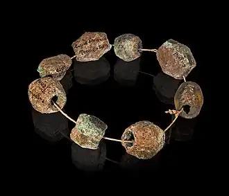 Parure en perles de bronze -  Holocène.