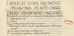 Texte en latin composé de grandes majuscules de couleur et d'un texte à l'encre noire.