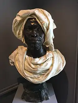 Buste d'homme (1884), plâtre teinté, musée des Beaux-Arts de Tours.