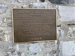 Plaque commémorative, sur la façade de l'église