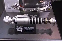 Répliques de poignées de sabres laser