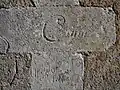 Inscriptions diverses gravées sur le mur extérieur de l'église Saint-Pierre de Granchain (face Sud)