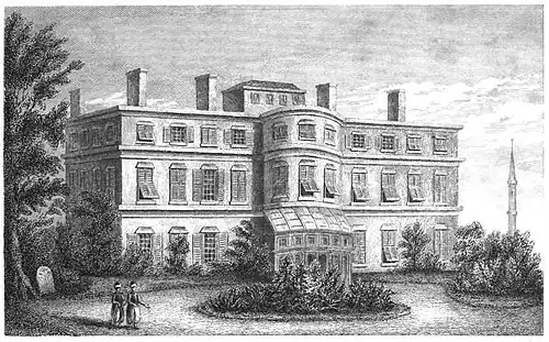 gravure noir et blanc d'un bâtiment à deux étages. Un minaret dans le fond