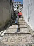Escalier de pierre édifié en 1891 donnant sur la ville haute.