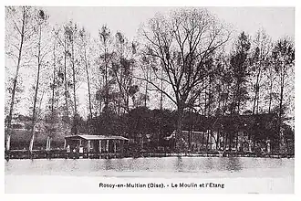 Les étangs, avec lavoir, en amont du moulin, vers 1910.