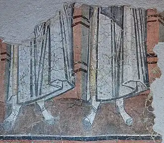 Personnages vêtus de chlamydes datant du VIIIe&nbsp;siècle.