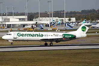 Un Fokker 100 de Germania à l'aéroport de Munich