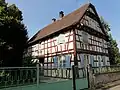 Une maison à colombages, rue de l'église.