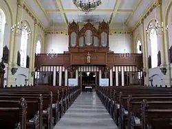 Vue de la nef vers la tribune de l'orgue Rinckenbach (1884).