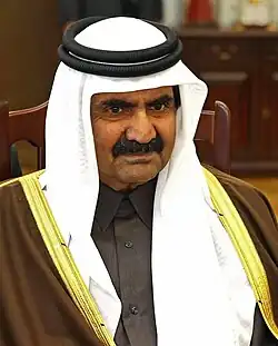 Hamad ben Khalifa Al Thani portant une ghutra.