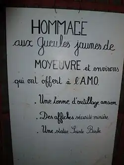 Pancarte de remerciement à destination des mineurs de Moyeuvre.