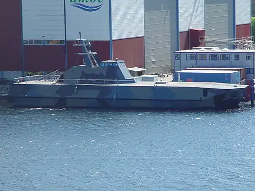 Le KNM Skjold, un casier à missiles (vide) ouvert.