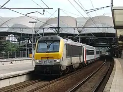 Train InterCity avec voitures I11 en gare de Louvain.