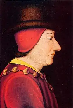 Peinture. Portrait de profil. Coiffé d'un bonnet rouge recouvert d'un chapeau sombre. Vêtu de rouge. Porte le collier de l'ordre de Saint-Michel.