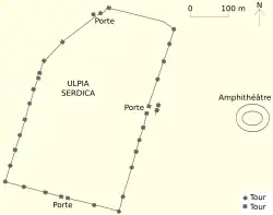 Plan schématisant l'emplacement d'un amphithéâtre antique en dehors de la ville.