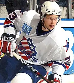 Photographie couleur d'un joueur de hockey sur glace