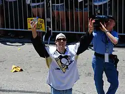 Photographie de Talbot lors de la parade de la victoire des Penguins