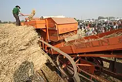 Liaison batteuse Merlin-monte-paille, inscription « Interdit de fumer (en néerlandais) », reconstitution.