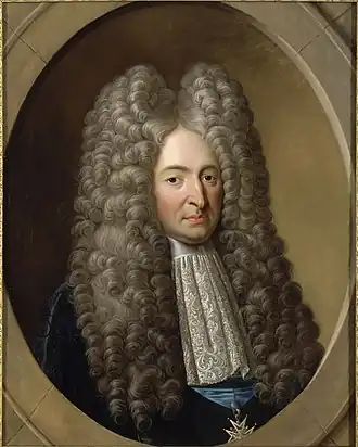 Portrait d'un homme portant perruque, en habit bleu.