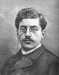 Dessin en noir et blanc d’un homme de face, aux cheveux légèrement ondulés, avec une moustache, des lorgnons, une chemise blanche et une veste foncée