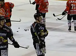 Photographie du joueur avec le maillot noir de Rouen