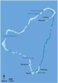 Dessin en couleur vives figurant les principaux caractères de l'atoll.