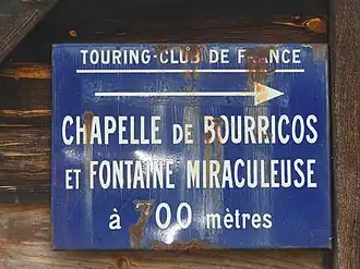 Panneau ancien du Touring club de France, où Bourricos est écrit avec deux « r ».