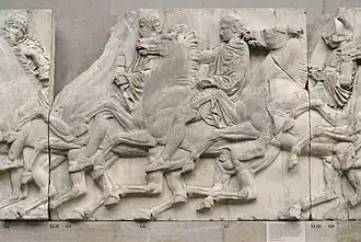 Frise représentant plusieurs cavaliers sur leur monture au galop