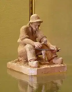 Batteur de faux (avant 1936), terre cuite, Remiremont, musée Charles-Friry.
