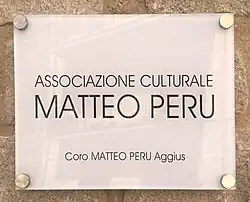 Photographie d'une plaque.