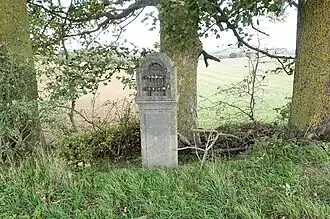 Potale Saint-Joseph de 1823, sculpté en pierre bleu.