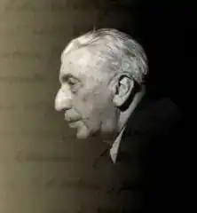 Photo en noir et blanc du profil gauche d'un homme aux cheveux blancs.