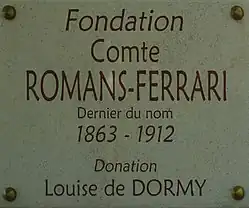 Plaque de la grille d'entrée est.