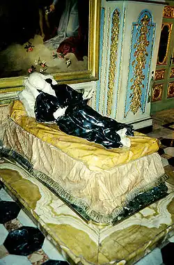 Statue baroque de San Stanislao Kostka (1705).  Église Saint-André du Quirinal, Rome.