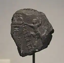 Bulle d'argile avec empreinte de scellement représentant une scène d'engrangement du grain. Musée du Louvre.