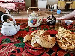 plats servis lors d'un accueil d'un invité à Turfan