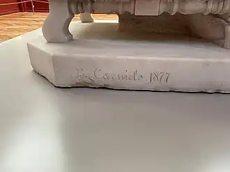 Signature de Carnielo sur la base de la sculpture.